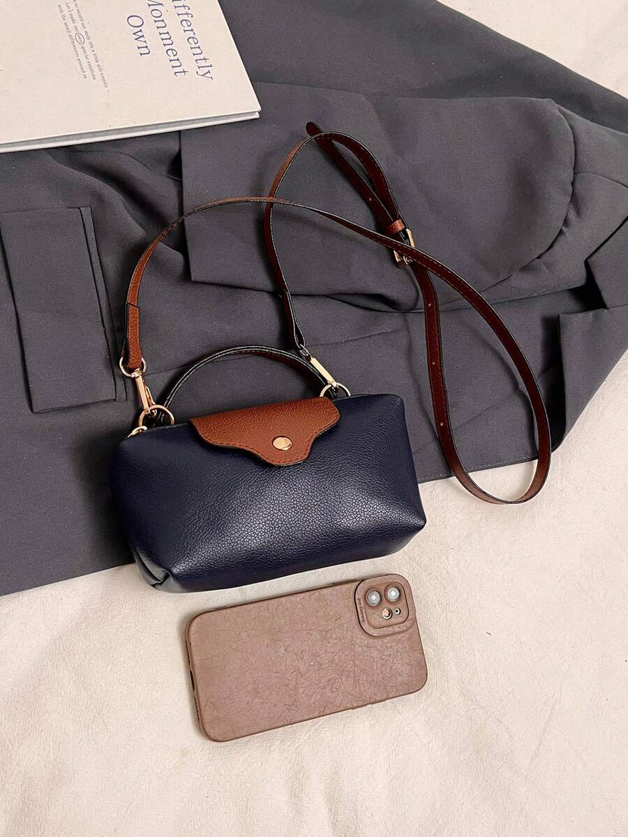 Mini waterdichte nylon tas voor dames met contrasterende details