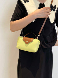 Mini waterdichte nylon tas voor dames met contrasterende details