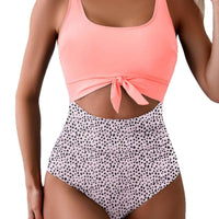 Badpak voor dames met buikcorrigerend effect, cut-out en strikknoop