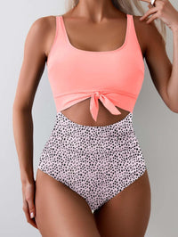 Badpak voor dames met buikcorrigerend effect, cut-out en strikknoop