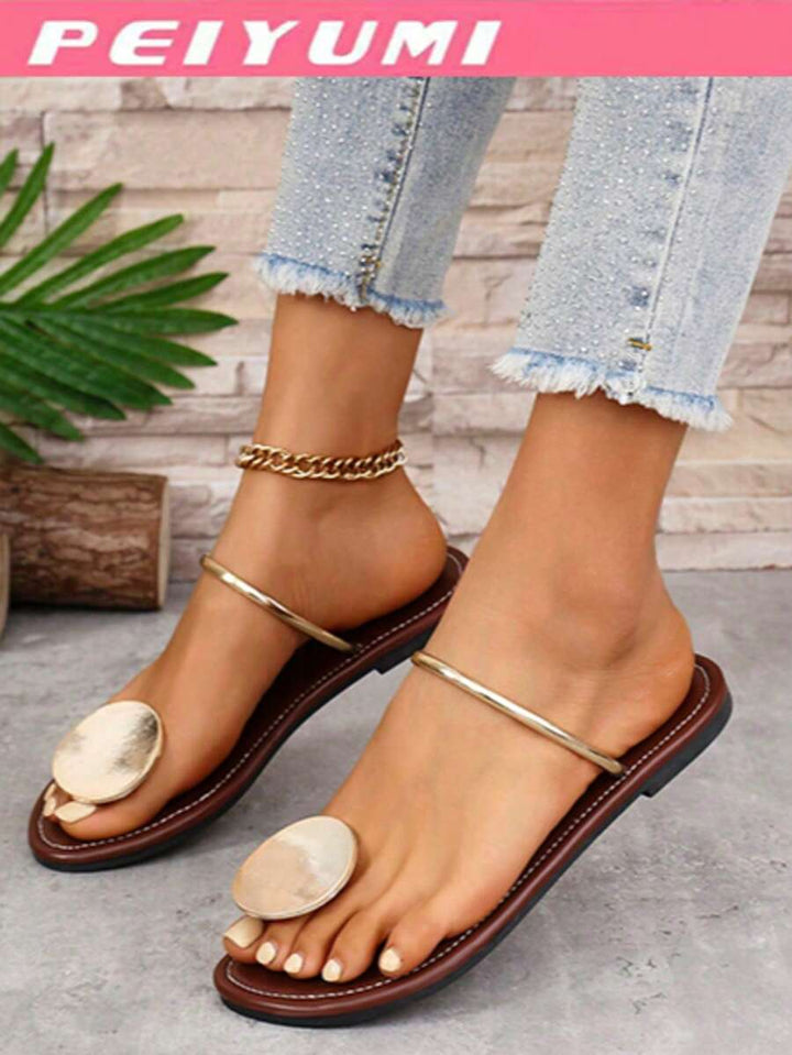 Kaelis Charm – Boho Statement Platte Sandalen