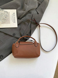 Mini waterdichte nylon tas voor dames met contrasterende details